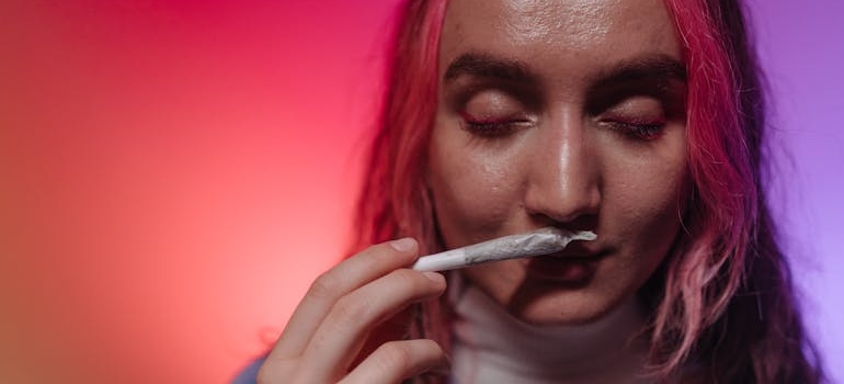 A woman holding weed