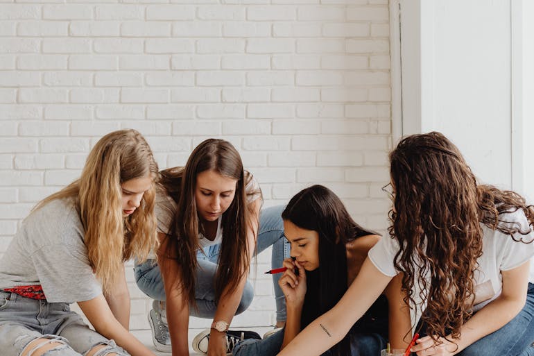 group of girls fighting fear of failure