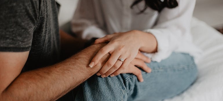 A couple holding hands