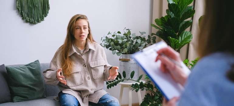 A person sitting in a counseling session.