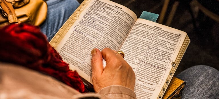 A person reading what does the Bible say about enabling