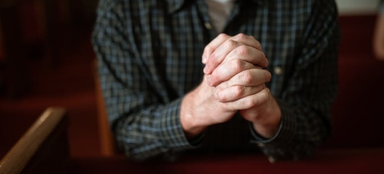 A person praying and trusting God when recovery feels difficult