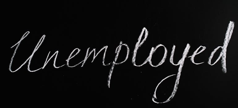 Unemployed writen on the black board
