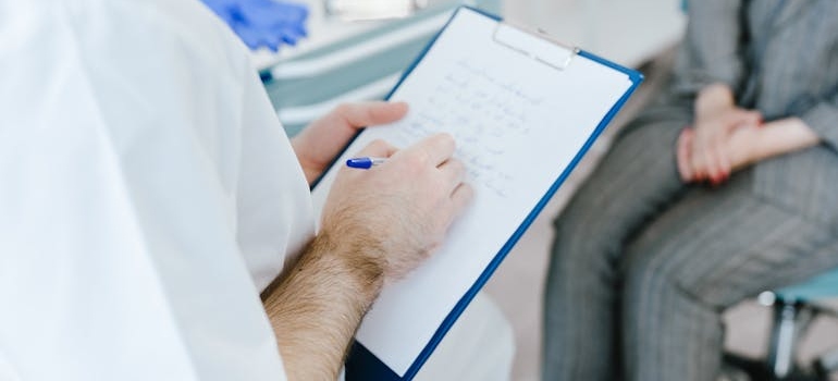 A doctor talking with the patient