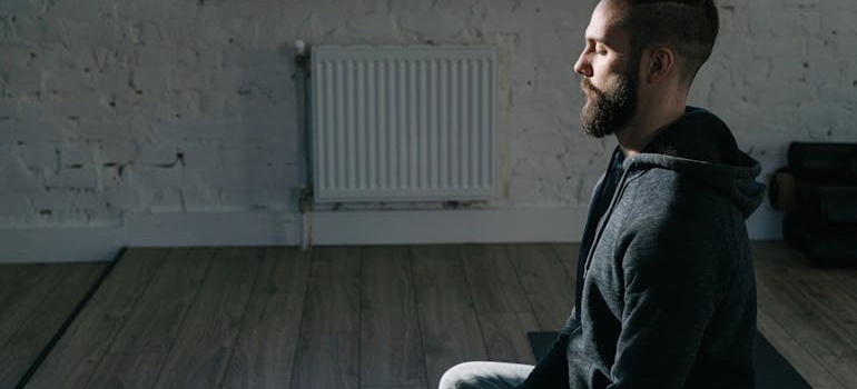 A man thinking does Adderall cause anxiety