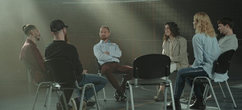 A group of people in one of the sober living resources near Hampton