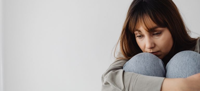 A person feeling depressed after using gas station drugs