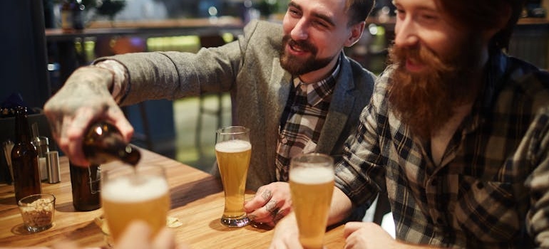 People drinking and talking