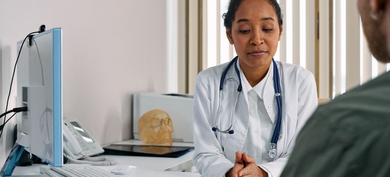Doctor explaining to a patient the difference between Suboxone vs Subutex