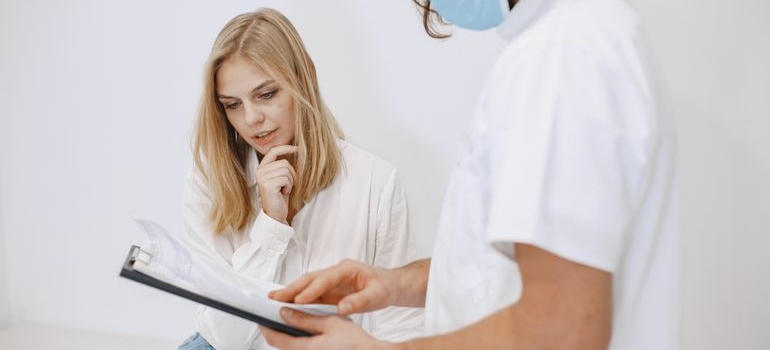 A patient talking with the doctor