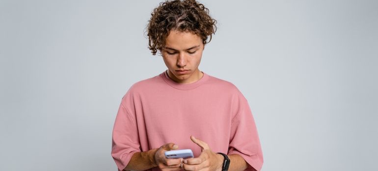 Teen looking at a smartphone