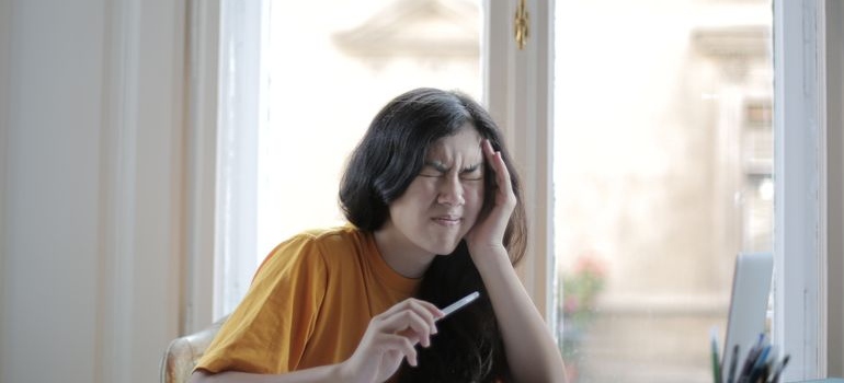 A woman having a headache