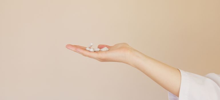 Hand holding medication